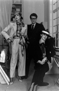 Yves Saint Laurent poses with models in his Couture Spring 1984 collection.