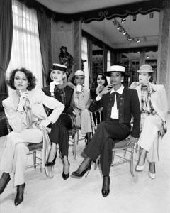 Model Violetta Sanchez, Dianne DeWitt, Rebecca Ayoko, Kirat Bhinder, and Mounia Orosemane pose in looks from Yves Saint Laurent's Couture Spring 1985 collection.