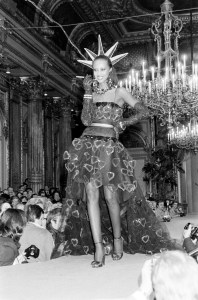 Iman walks the runway in evening wear from the Yves Saint Laurent Couture Spring 1980 at Le Gran InterContinental Hotel in Paris.
