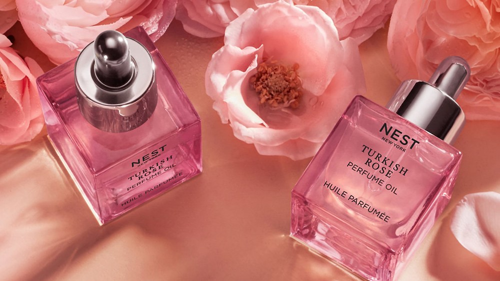 Nest rose perfume bottles and flowers