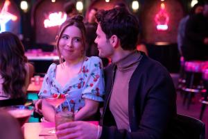 Dollface -- “Birthday Girl” - Episode 210 -- The girls attend Stella’s bar opening and make important decisions about their relationships, careers, and futures. Jules gives Madison a birthday surprise. Izzy (Esther Povitsky) and Liam (Jayson Blair), shown. (Photo by: Jessica Brooks/Hulu)