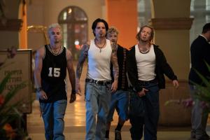 Pam & Tommy -- “I Love You, Tommy" - Episode 102 -- Pamela Anderson and Tommy Lee meet, get high and get married… all in four days. Ace (Zack Gold), Tommy (Sebastian Stan), Nico (Casey Leach), and Zakk (Sam Meader), shown. (Photo by: Erin Simkin/Hulu)