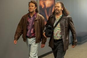 Pam & Tommy -- “Jane Fonda" - Episode 103 -- Rand teams up with an old porn-world associate to shop the tape around town. Rand (Seth Rogen) and Miltie (Nick Offerman), shown. (Photo by: Kelsey McNeal/Hulu)