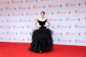 Daisy Ridley poses for photographers upon arrival at the 75th British Academy Film Awards, BAFTA's, in London Sunday, March 13, 2022. (Photo by Vianney Le Caer/Invision/AP)