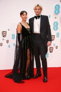 Millie Bobby Brown, left, and Jake Bongiovi pose for photographers upon arrival at the 75th British Academy Film Awards, BAFTA's, in London Sunday, March 13, 2022. (Photo by Joel C Ryan/Invision/AP)