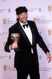 Troy Kotsur holds his Supporting Actor award for his role in the film 'Coda' at the 75th British Academy Film Awards, BAFTA's, in London Sunday, March 13, 2022. (Photo by Joel C Ryan/Invision/AP)