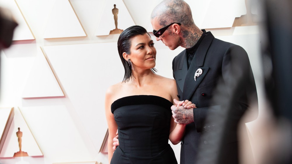 Kourtney Kardashian and Travis Barker at the 2022 Oscars.