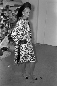 A model poses in a leopard print dress and jacket worn with the two-toned slingback pump from the Chanel Fall 1973 Couture collection. The collection was the debut of newly hired artistic director Ramon Esparza.