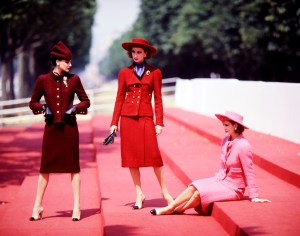 Ines de la Fressange, Tara Shannon and a model pose in looks from Chanel's Haute Couture Fall 1983 collection. The collection is the second under the artistic direction of designer Karl Lagerfeld.