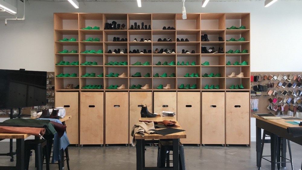 The studio features a small workshop space
