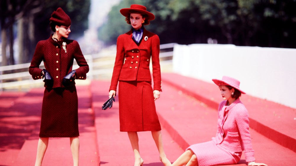 Ines de la Fressange, Tara Shannon and a model pose in looks from Chanel's fall 1983 Haute Couture collection advance. The collection is the second under the artistic direction of designer Karl Lagerfeld.