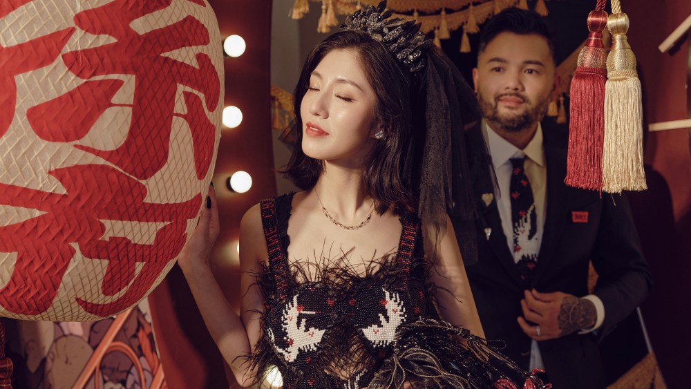 Cristine Sun wearing a bespoke wedding gown by Yueqi Qi.