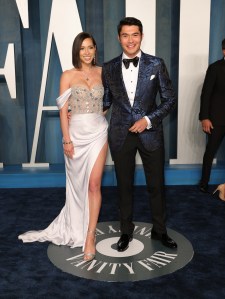 Liv Lo and Henry Golding at the Vanity Fair Oscar Party held at the Wallis Annenberg Center for the Performing Arts on March 27th, 2022 in Beverly Hills, California.