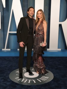 Adrien Brody and Georgina Chapman at the Vanity Fair Oscar Party held at the Wallis Annenberg Center for the Performing Arts on March 27th, 2022 in Beverly Hills, California.