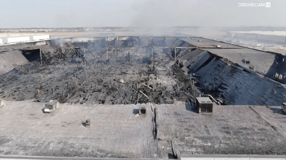 An aerial view of Walmart's Plainfield, Ind. distribution center, which caught fire on Wednesday, seen here with the roof caved in.