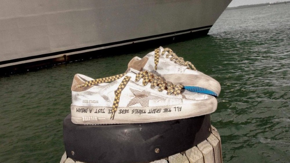 Golden Goose, the Italian distressed sneaker brand, plans to merge with an unnamed, in-country supplier known for sustainable research and development.