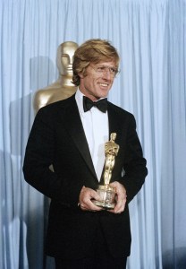 Actor Robert Redford holding Oscar he won for best director ?Ordinary People,? at the Academy Awards, March 31, 1981 in Los Angeles. (AP Photo)