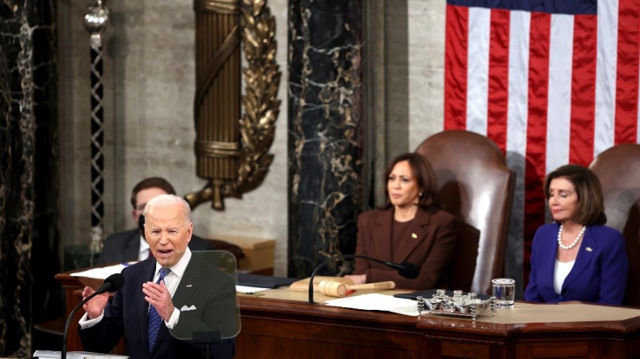 President Joe Biden delivers his first State of the Union address to a joint session of Congress at the Capitol, Tuesday, March 1, 2022, in Washington as Vice President Kamala Harris and House speaker Nancy Pelosi of Calif., look on.