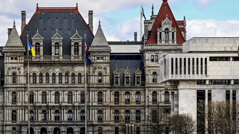 FILE - A partial views of the New York state Capitol building, left, is shown next to the state Appellate court building in foreground, right, Monday, April 4, 2022, in Albany, N.Y. A panel of five mid-level New York appellate judges have ruled on Thursday, April 21, 2022 that state Democrats engaged in gerrymandering when drawing new congressional district boundaries for the next decade. (AP Photo/Hans Pennink, File)