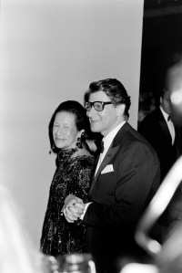 Diana Vreeland and designer Yves Saint Laurent arrive for the Metropolitan Museum of Art Costume Institute "Yves Saint Laurent: 25 Years of Design" exhibition and gala on December 5, 1983.