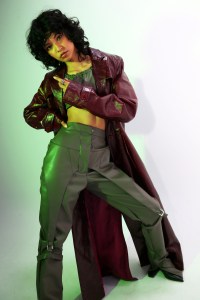 Elena Velez’s vegan leather top and pants under SRVC’s leather trenchcoat. M.Gemi boots. Vitaly Design rings and bracelets.