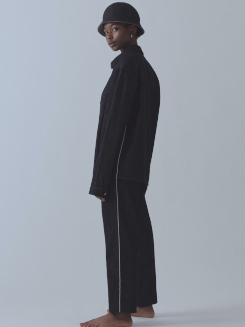Genderless denim label Non launched a collection of denim tracksuits and bucket hats in light, dark and raw denim washes.