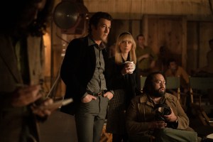 Pictured: Miles Teller as Al Ruddy, Juno Temple as Bettye McCartt and Dan Fogler as Francis Ford Coppola of the Paramount+ original series THE OFFER. Photo Cr: Nicole Wilder/Paramount+ ©2022 Paramount Pictures. All Rights Reserved.
