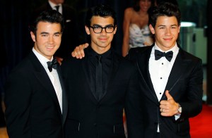 The Jonas Brothers, Kevin, Joe and Nick attends the 2010 White House Correspondents' Dinner at the Washington Hilton Saturday, May 1, 2010, in Washington. (AP Photo/Luis M. Alvarez)