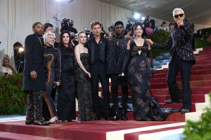 Catherine Martin, Alton Mason, Kelvin Harrison Jr., Olivia DeJonge, Austin Butler, Priscilla Presley, Jerry Schilling, Kacey Musgraves, and Baz Luhrmann at The 2022 Met Gala celebrating In America: An Anthology of Fashion held at the The Metropolitan Museum of Art on May 2, 2022 in New York City.