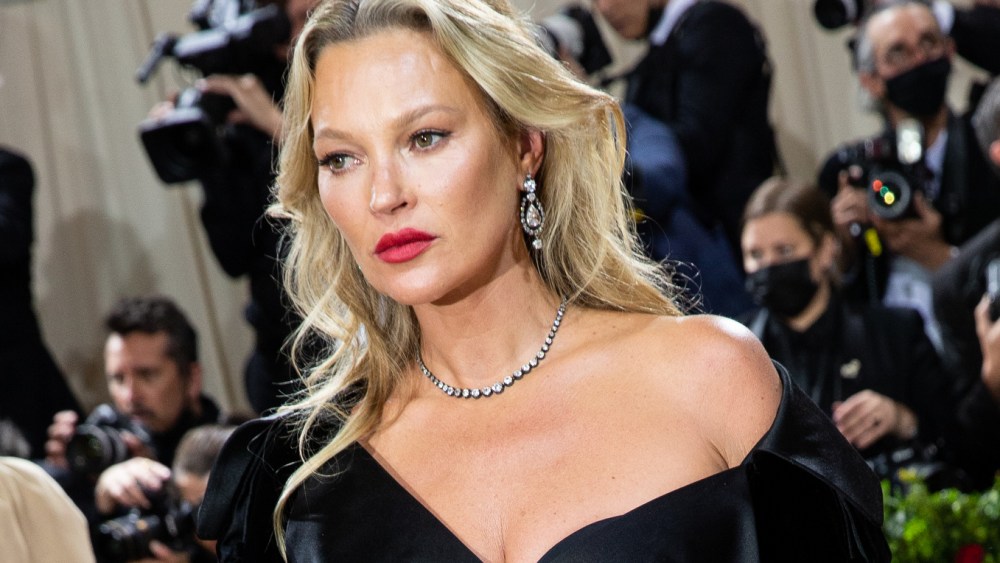 Kate Moss wore  antique earrings, a victorian necklace, and Cartier ring from New York jeweler, A La Vieille Russie