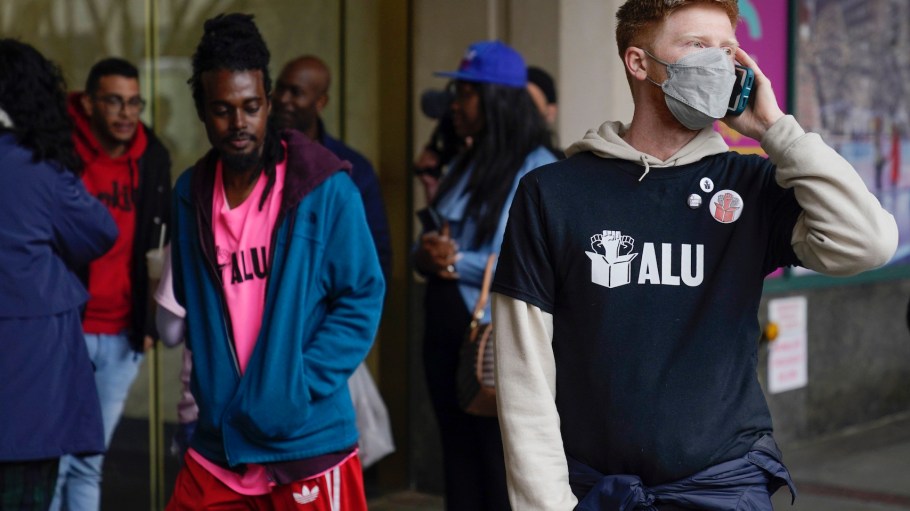 Members and supporters of the Amazon Labor Union stand outside an office of the National Labor Relations Board after a count of votes for unionization was concluded in New York, Monday, May 2, 2022.
