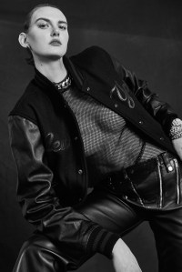 Polo Ralph Lauren x MLB Collection’s wool and leather Yankee jacket, Dion Lee’s leather pants and Zara mesh tank top. Rolex watch; Etiq earrings; Bulgari watch; David Yurman bracelet; Louis Vuitton bracelet; Vitali bracelet.