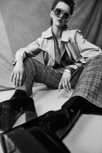 Brunello Cucinelli’s wool and cashmere blazer and trousers under Nili Lotan’s cotton and nylon trenchcoat. Versace platform boots; Lapima sunglasses; Etiq earrings; Bulgari watch; David Yurman bracelet; Louis Vuitton bracelet; Vitali bracelet; Ali Grace signet ring; Reframed Jewellery signet ring.
