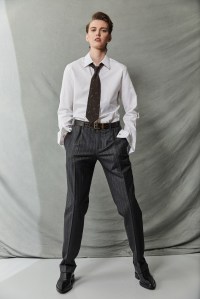 Hermès cotton button-down and Canali’s wool-cashmere pants. Jil Sander shoes; Michael Kors belt; Etiq earrings.