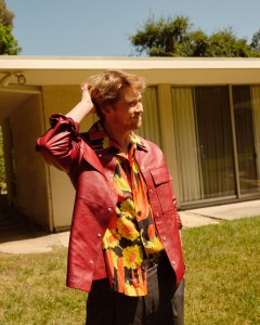 Jil Sander’s leather shirt jacket; Loewe’s silk shirt and sandals; Brioni’s wool and silk blend pants. David Yurman ring.