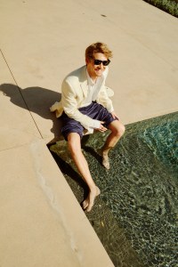 Canali’s linen jacket over Louis Vuitton Men’s silk shirt and Tom Ford’s viscose tank top; CDLP’s lyocell pants. Alwin’s own sunglasses; David Yurman ring.