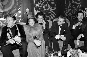 Halston (L) and Regine Zylberberg (2nd from L) attend a carnival-themed party at Regine's nightclub, 1980.