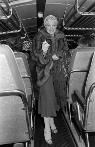 Regine Zylberberg rides from Regine's in Manhattan to a boxing match at Yankee Stadium in the Bronx, 1976.
