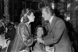 Regine Zylberberg and Kirk Douglas (R) attend a party in New York City, 1977.