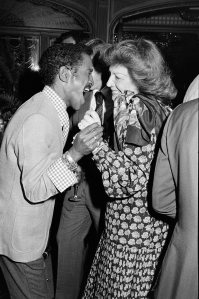 Sammy Davis Jr. and Regine Zylberberg attend a party in Los Angeles, California, 1977.