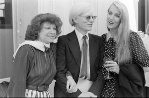 Regine Zylberberg, Andy Warhol, and Jerry Hall attend a party celebrating the 1979 Monaco Grand Prix race in Monaco, 1979.