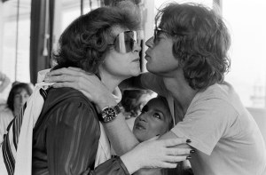 Regine Zylberberg, Jerry Hall, and Mick Jagger attend a party celebrating the 1979 Monaco Grand Prix race in Monaco, 1979.
