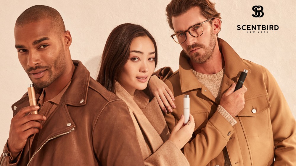 Scentbird models posing with fragrance