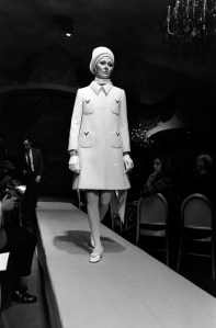 A model walks the runway in a look from "The White Collection" during the House of Valentino spring 1968 couture fashion show and benefit at the St. Regis hotel in New York City.