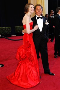 Anne Hathaway and Valentino Garavani attend the 83rd annual Academy Awards at the Kodak Theatre in 2011. Hathaway wears vintage Valentino Haute Couture, with Tiffany & Co. jewels.