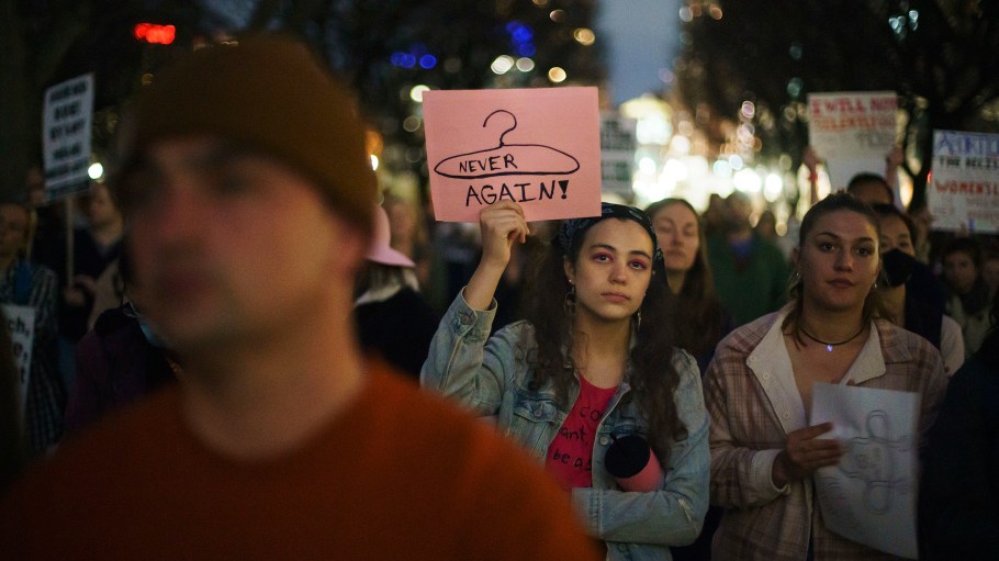 Demonstrators protest the news that the U.S. Supreme Court could be poised to overturn Roe v. Wade.