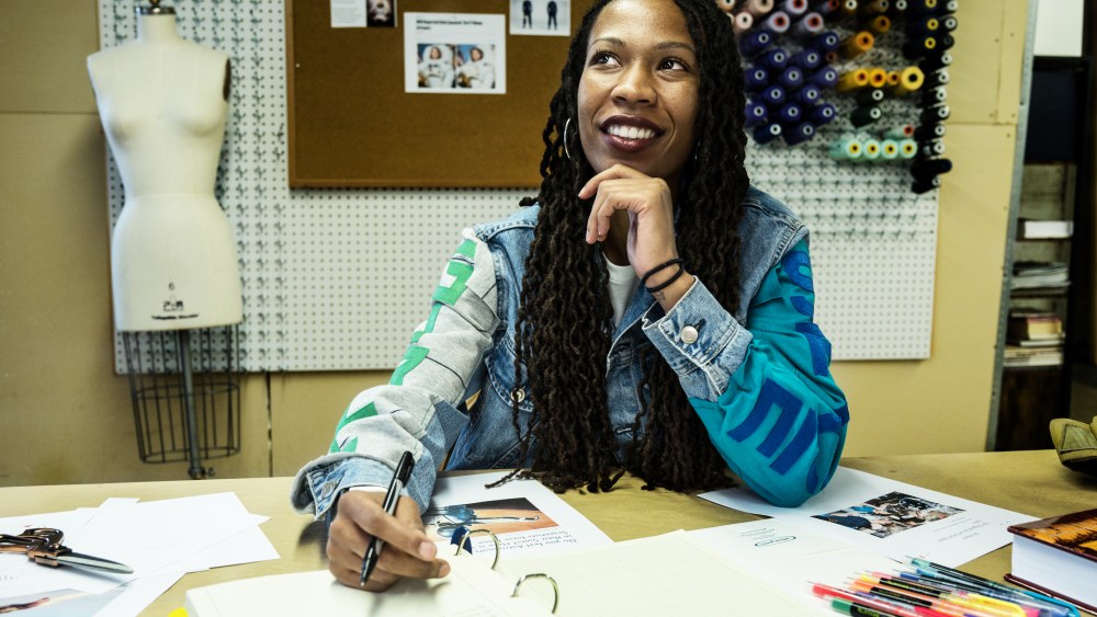 Girl In Space founder Sabrina Thompson at work wearing one of her designs.