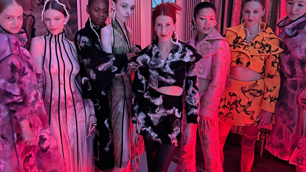 Clara Pinto with models wearing her designs at London Craft Week.