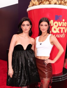 Dixie DAmelio and Charli DAmelio at the MTV Movie & TV Awards: Unscripted held at Barker Hangar on June 2, 2022 in Santa Monica, California.