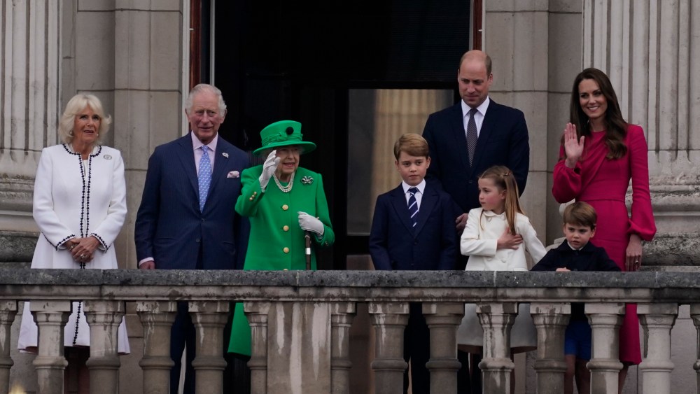Queen Elizabeth II stands on the balcony with the Royal family during the Platinum Jubilee Pageant outside Buckingham Palace in London.